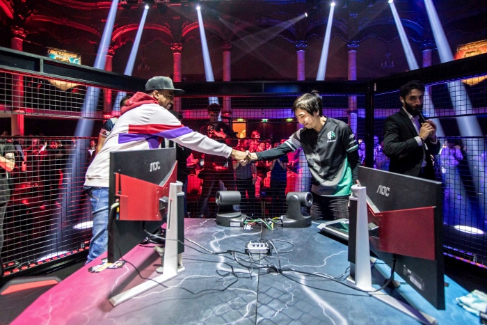 EVO Champion Problem X shakes hands with Red Bull Kumite 2018 champion Fujimura in Paris, France on November 11th 2018