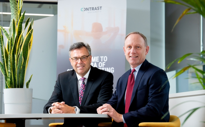 (L-R) Alastair Hamilton, CEO, Invest Northern Ireland and Alan Naumann, CEO, Contrast Security discussing the deal.