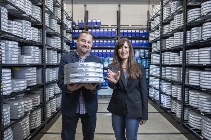 Brad holds four of the 22 reels that comprise the film in 35mm film.